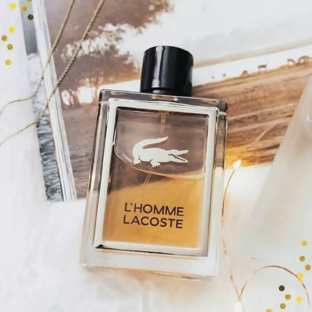 عطر لاكوست لاهوم - أو دي تواليت للرجال 100 مل من ماركة Lacoste - أكسيك Axeek