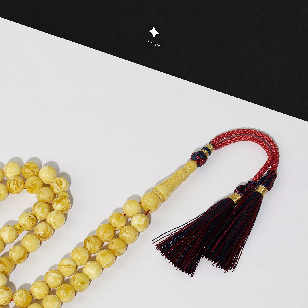 مسباح بكلايت اصفر معرق مع كركوشة 3K24 من ماركة SWADNESS - أكسيك Axeek