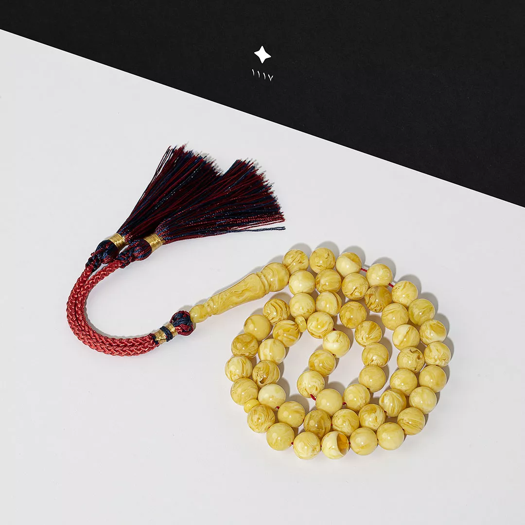 مسباح بكلايت اصفر معرق مع كركوشة 3K24 من ماركة SWADNESS - أكسيك Axeek
